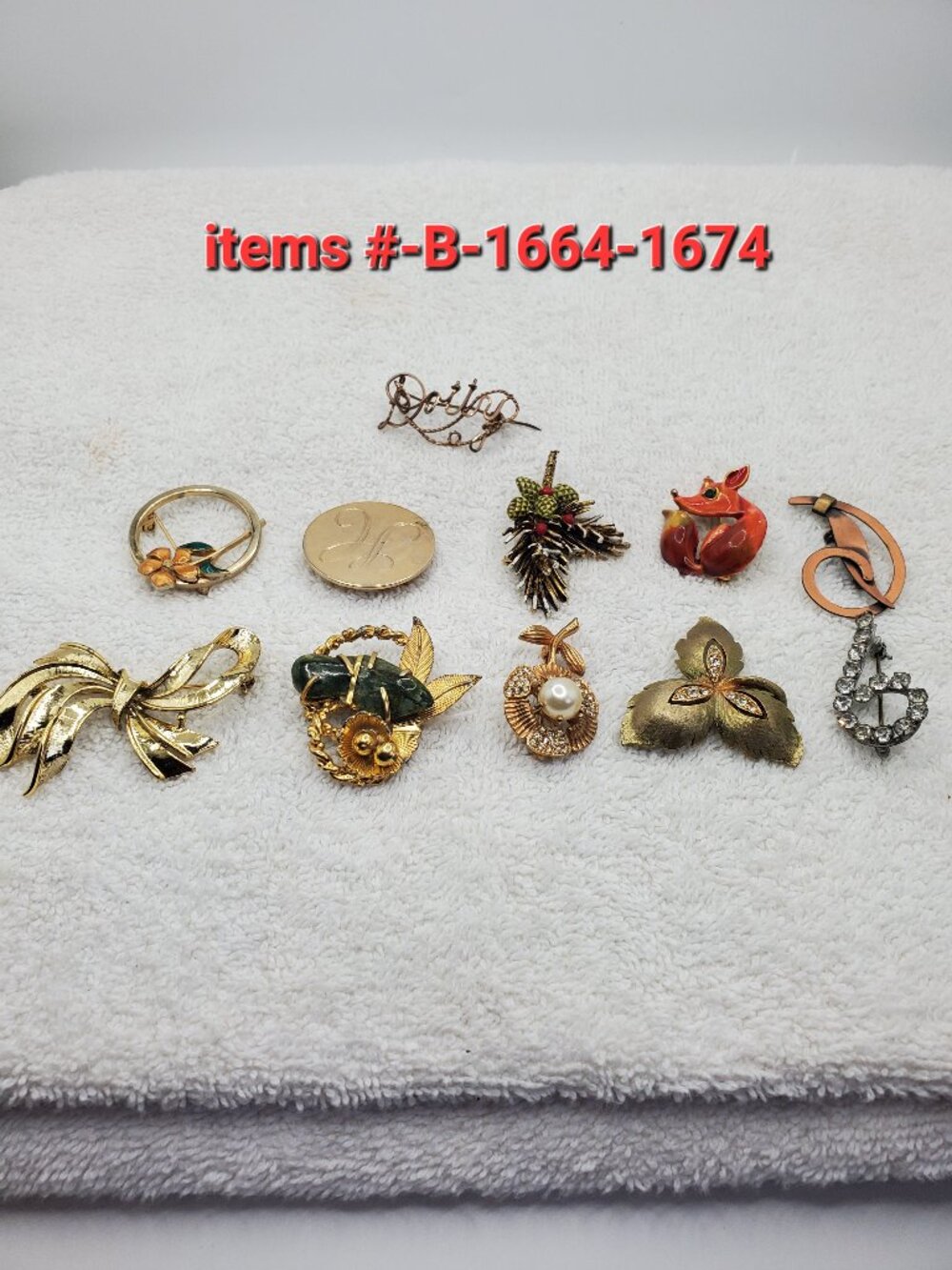 11 Brooches items # B-1664-1674,. wt . 110 grams.